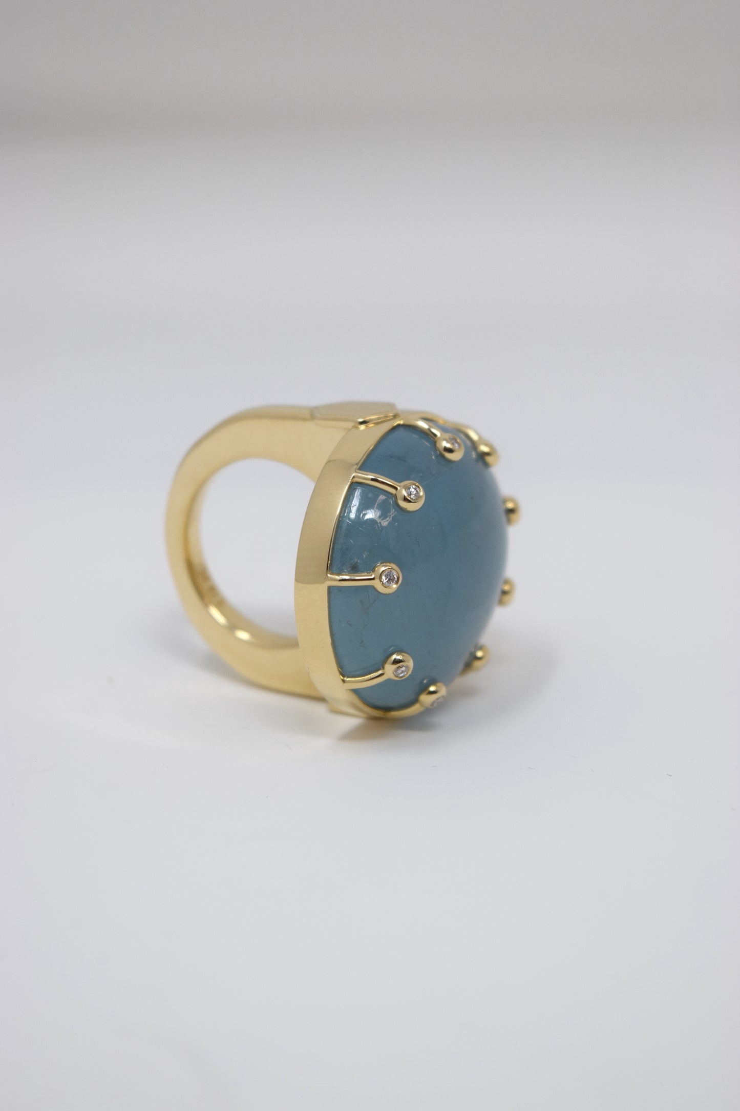 Solid 10k Gold Consort Ring with Large Oval Aquamarine Stone and x9 Diamonds